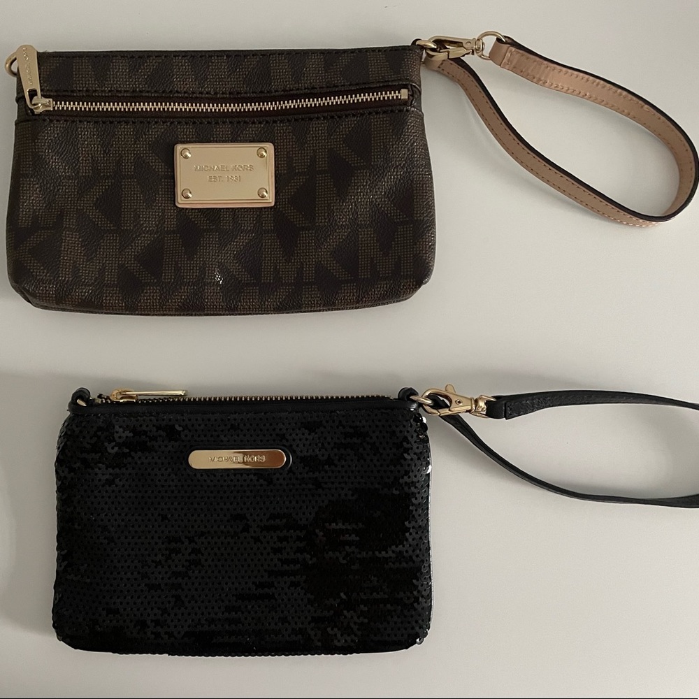 Two Michael Kors clutches.